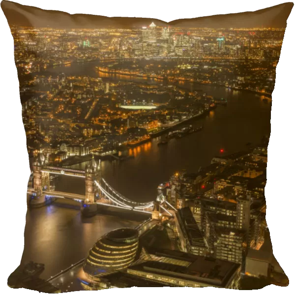 Aerial view of River Thames and Tower Bridge in London at night. October 2014