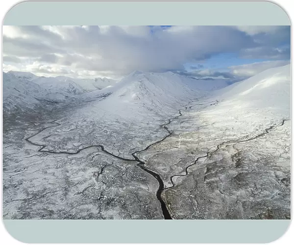 Aerial view of three tributaries of the River Affric, Allt Gleann Gniomhaidh, Allt Cam-ban and Allt a chomhlain meeting at the base of Ciste Dhubh, Glen Affric Nature Reserve, HIghlands, Scotland, UK. November, 2017