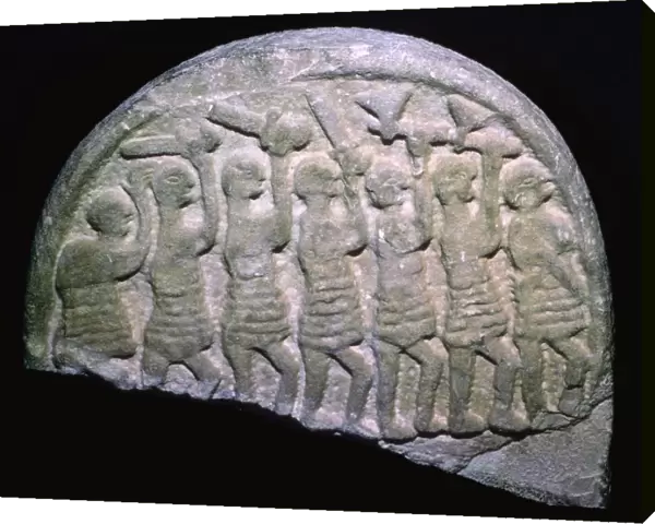 The Lindisfarne Stone showing warriors who may be vikings, Holy Island, Northumbria