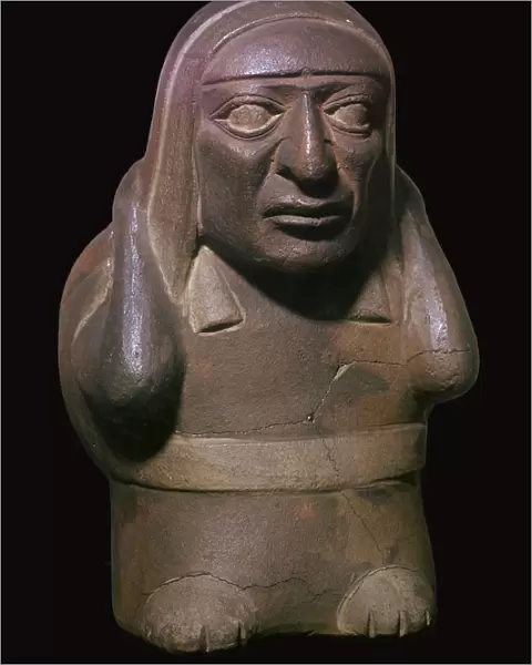 Peruvian earthenware jar in the form of a squatting figure, 5th century BC