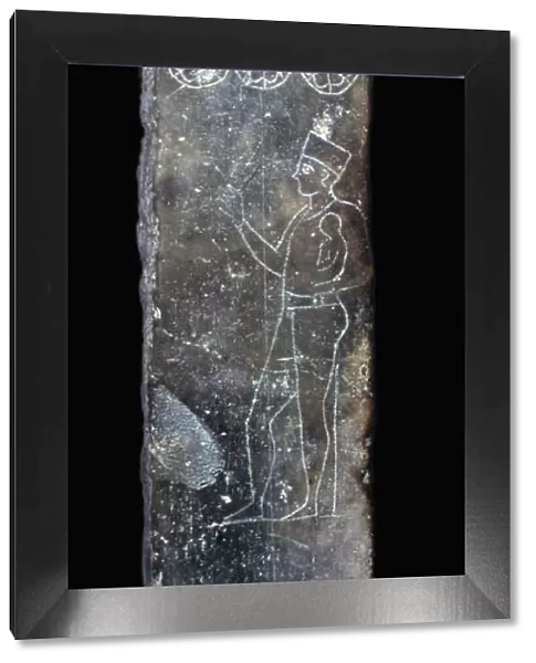 Punic stela of a priest holding a child
