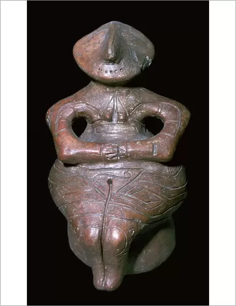 Baked clay sitting figure, 4th millenium BC