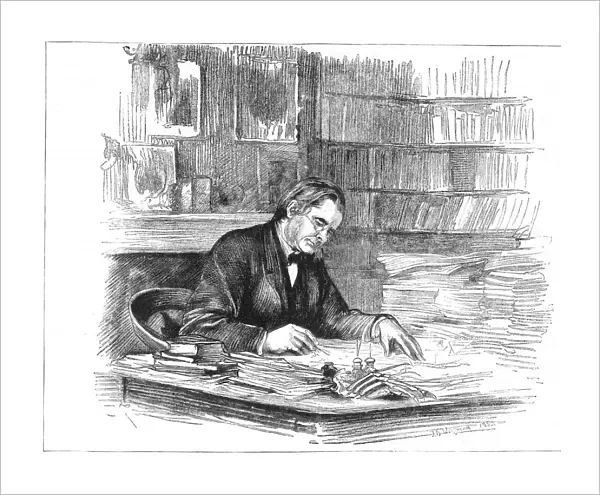 Thomas Henry Huxley, British biologist, at his desk in 1882 (1883)