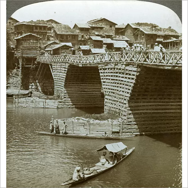 Quaint bridge and houses, City of Sun, Kashmir, India, c1900s(?). Artist: Underwood & Underwood