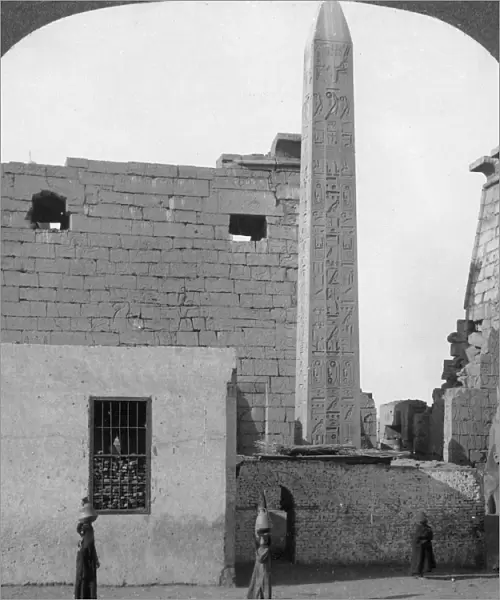 The obelisk of Rameses II and front of Luxor Temple, Thebes, Egypt, 1905. Artist: Underwood & Underwood