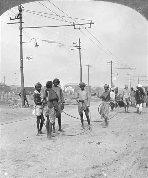 Men about to draw a heavy load, Rangoon, Burma, 1908. Artist: Stereo Travel Co