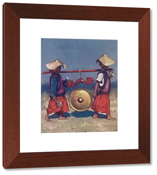 Shan Retainers carrying Brass Gong, 1903. Artist: Mortimer L Menpes