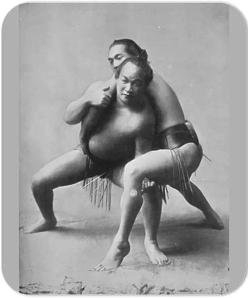 A sumo wrestling bout between a pair of Japanese professionals, 1902