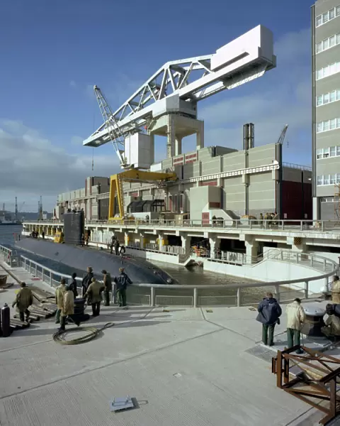 A nuclear submarine berthing at Devonport docks, Plymouth, Devon, 1980