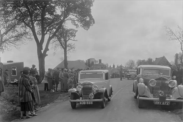 Austin sports saloon of Mrs MS Flewitt and Rolls-Royce saloon at the RSAC Scottish Rally, 1934