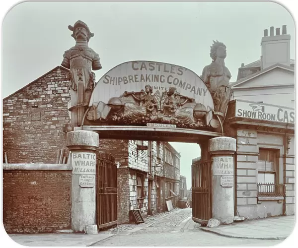 Ships figureheads over the gate at Castles Shipbreaking Yard, Westminster, London, 1909