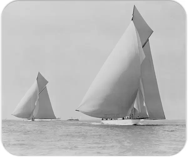 The sailing yachts White Heather and Shamrock, race downwind