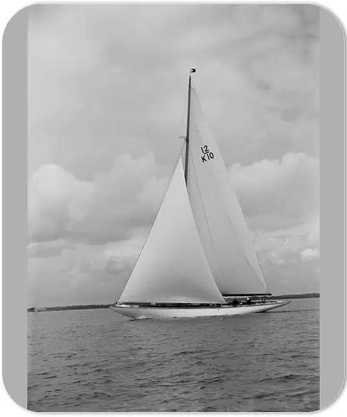 Trivia, a 12 Metre class yacht sails close-hauled, 1939. Creator: Kirk & Sons of Cowes