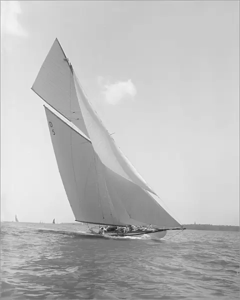 The 15 Metre Hispania sailing close-hauled, 1911. Creator: Kirk & Sons of Cowes
