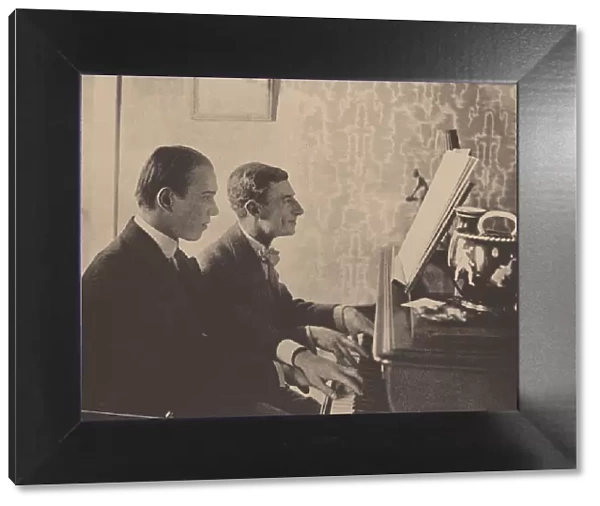 Nijinsky and Maurice Ravel at the piano playing a score from Daphnis and Chloe, 1912