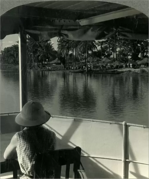 On a Steamer on the Lualaba River, Belgian Congo - A Native Village at the Waters Edge, c1930s