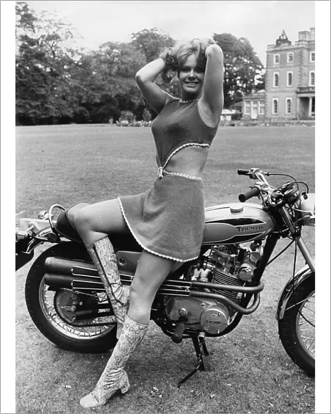 Monty Python actress Carol Cleveland on Triumph Bandit motorcycle, 1971. Creator: Unknown