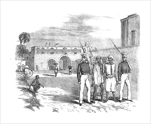 Calcutta Gate and Main Guard, Fort William: Native Prisoners under Escort, 1857. Creator: Unknown