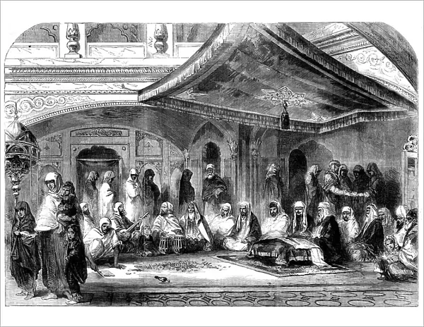 Interior of a Sikh Temple at Umritzir - reading the Grunt'h, 1858. Creator: Unknown