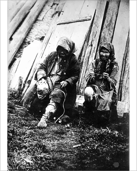 Tutur Tungus. Dudovka camp. Old women twist threads from deer tendons, 1920-1939. Creator: Unknown