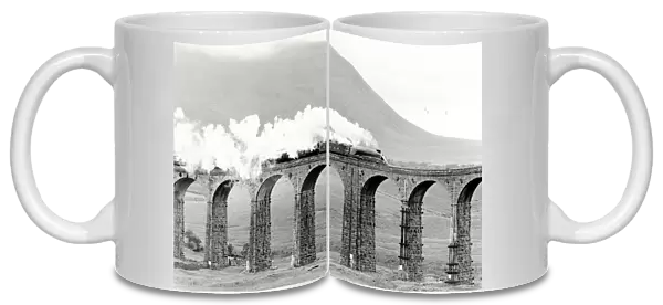 Mallard steaming over Ribblehead Viaduct