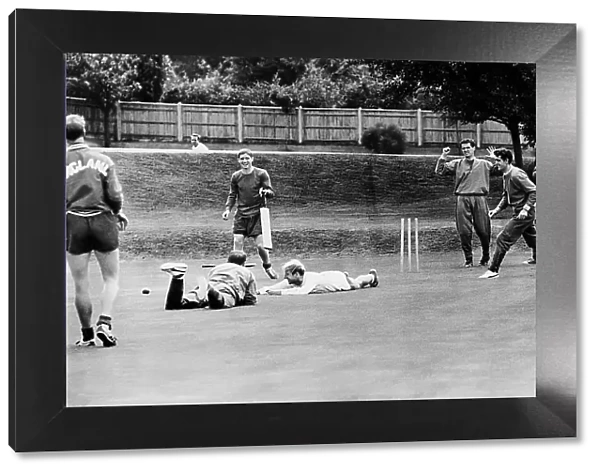 England's footballers enjoy a game of cricket at their Roehampton training ground prior to their World Cup match against Mexico 1966