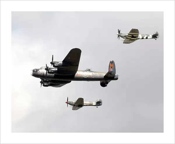 A flypast of three planes from the Battle of Britain Memorial Flight during the International