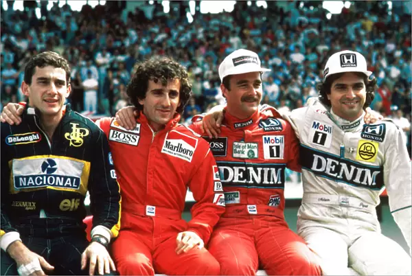 Formula One World Championship: Ayrton Senna Lotus 98T, 4th place, Alain Prost McLaren MP4  /  2C, 2nd place, Winner Nigel Mansell Williams FW11