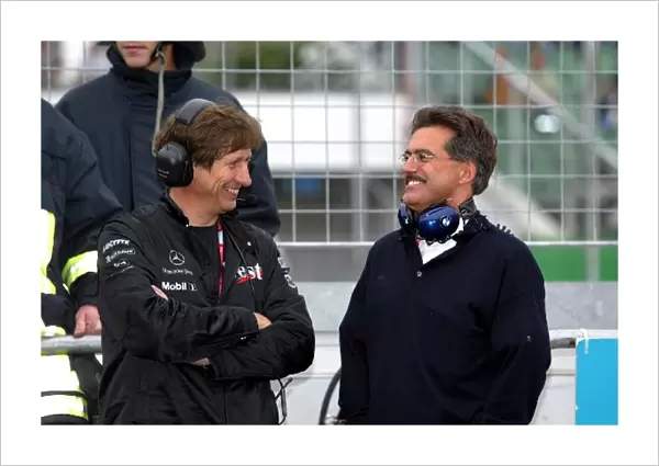 Formula One World Championship: Mario Illien Ilmor Engineering Technical Director shares a joke with Mario Theissen BMW Motorsport Technical