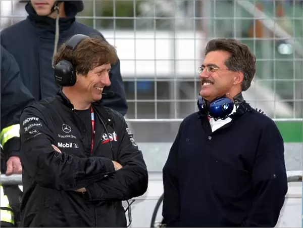 Formula One World Championship: Mario Illien Ilmor Engineering Technical Director shares a joke with Mario Theissen BMW Motorsport Technical