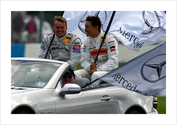 DTM. Marcel Fassler (SUI) AMG-Mercedes and Katsutomo Kaneishi (JPN) ARTA AMG-Mercedes.