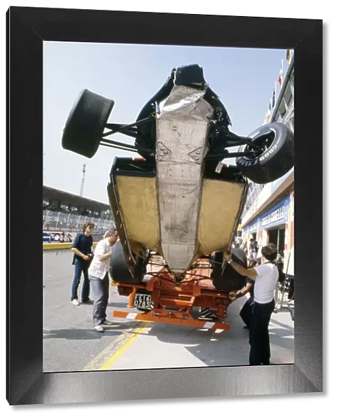 1980 Italian Grand Prix. Imola, Italy. 12-14 September 1980. A crashed Lotus 81-Ford Cosworth showing underbody aerodynamics. Crash, accident. World Copyright: LAT Photographic Ref: 35mm transparency 80ITA03