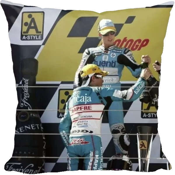 MotoGP. 125cc podium and results:. 1st Pol Espargaro (ESP), Derbi, centre.