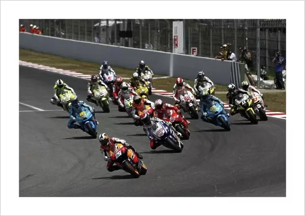 MotoGP. Dani Pedrosa (ESP), Repsol Honda Team, leads at the start of the race.
