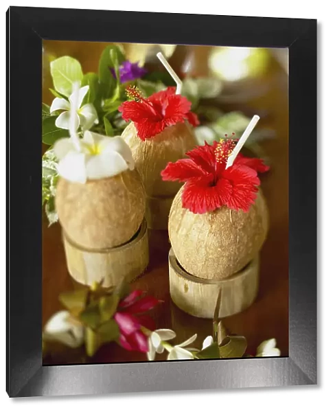 French Polynesia, Bora Bora, Close-Up Of A Refreshing Tropical Cocktails In Coconut Cups