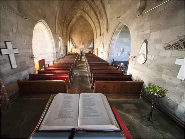 Northumberland, England; An Open Bible At The Back Of A Church