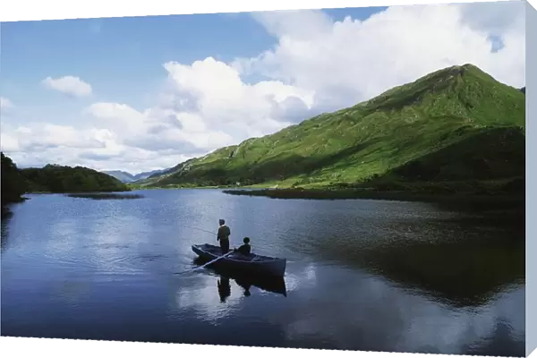 Kylemore Lake, Co Galway, Ireland; People Fishing On A Lake