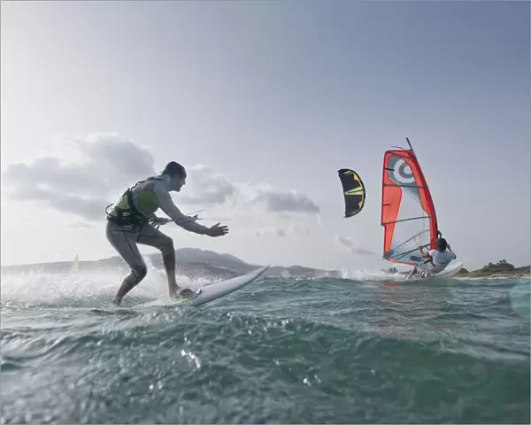 Kitesurfer and windsurfer along the coast; tarifa cadiz andalusia spain