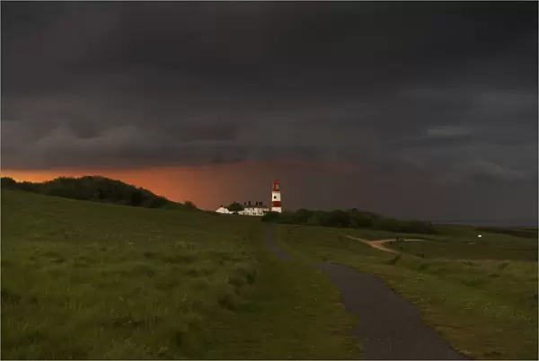 Souter Lighthouse Along The Coast Under Ominous Storm Clouds; South Shields, Tyne And Wear, England