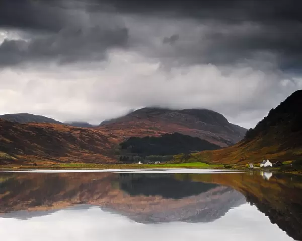 Mirror Image Of Land In The Water, Loch Sunart, Scotland