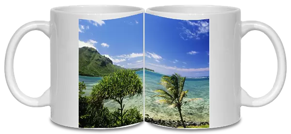 USA, Hawaii, Oahu, Crystal Clear Water And Lush Green Mountains In Distance; Kahana Bay, Bright Blue Sky