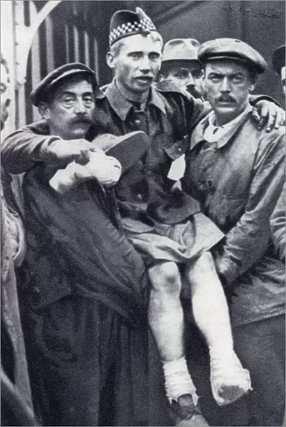 Porters At Boulogne, France, Carrying A Scot Soldier Who Has Been Wounded In Both Feet During The First World War. From The Illustrated War News Published 1914