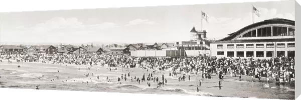 Crowds enjoying the surf at Venice beach, Los Angeles, California, United States of America, c. 1915. From Wonderful California, published 1915