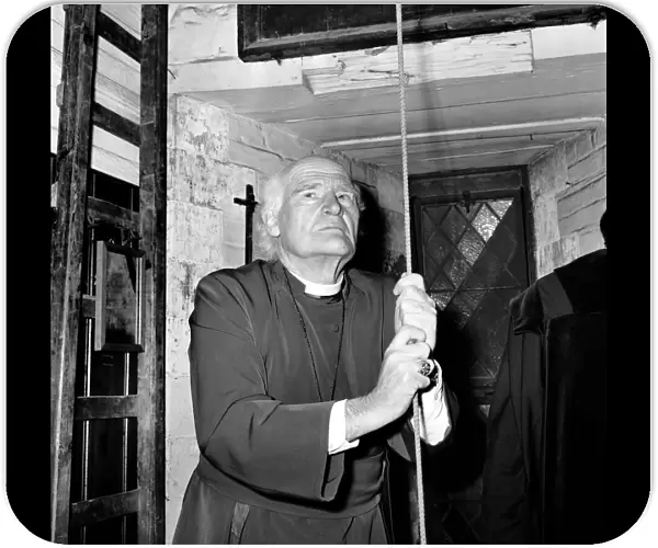 Religion: Arthur Michael Ramsey. The Archbishop of Canterbury tolling the bell