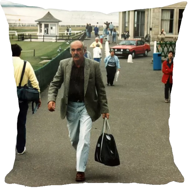 Sean Connery walking up street