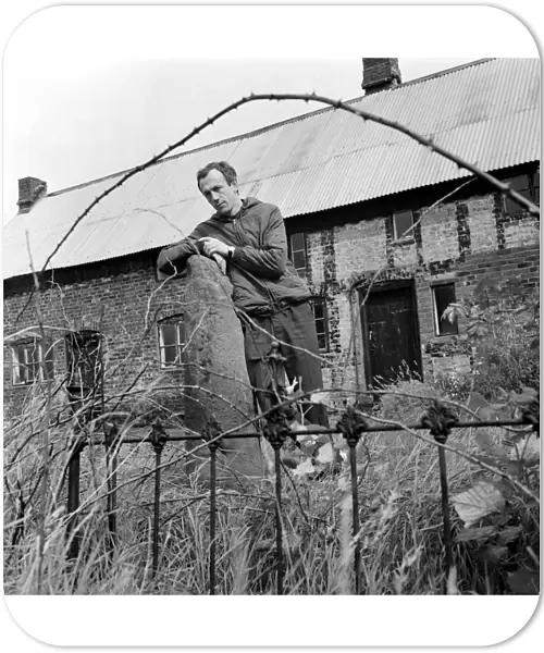 Author Alan Garner in his back garden at Toad Hall, Blackden-cum-Goostrey, Cheshire