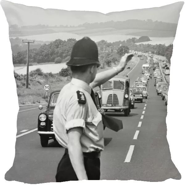 Policeman directing August Bank Holiday taffic on the A20