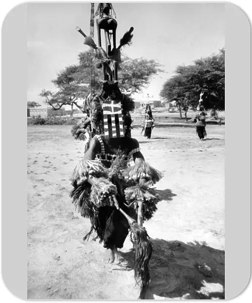 Trans African hovercraft expedition. Wearing his mask, one of the Pagan dancers of