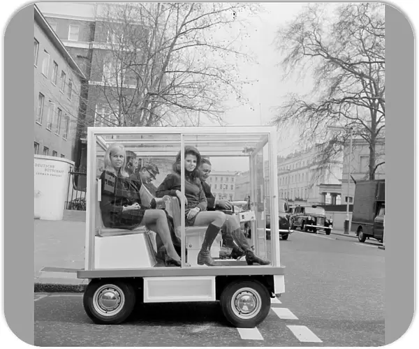 Jenny Hopkirk with her friend Sue Winchester (right) as they are driven around