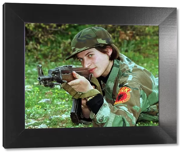 Luljeta Gashi of the Kosovo Liberation Army KLA April 1999 Soldier taking aim with